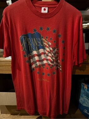 Delta Red Short-Sleeve Graphic Tee with Flag Design